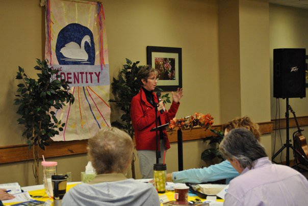 Jennifer teaching TI at early women's retreat.